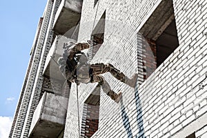 Rappeling with weapons