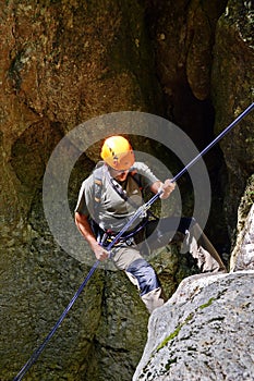 Rappelling climber. Rappel