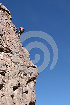 Rappelling a Stone Cliff