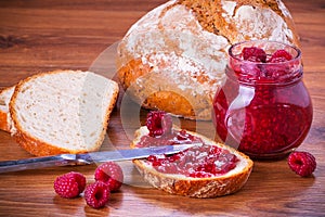 Rapsberry jam with slice of bread