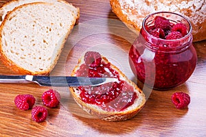 Rapsberry jam with slice of bread