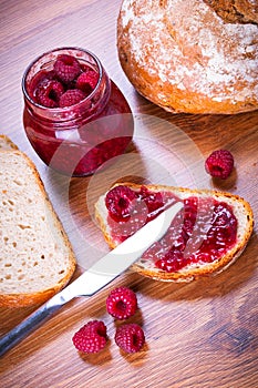 Rapsberry jam with slice of bread