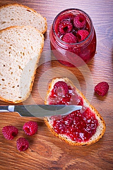 Rapsberry jam with slice of bread