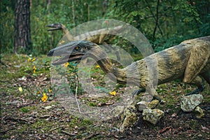 Raptor dinosaurs statues