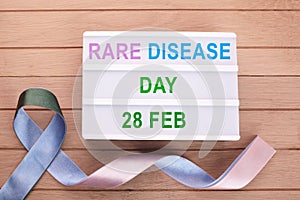 Rare Disease Day Poster or Banner Background. Top view