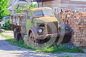 Rare old truck, rusty metal. Abandoned on the side of the car