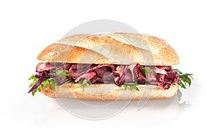 Rare roast beef and fresh rocket on a baguette