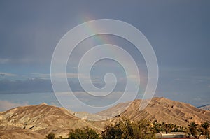 Rainbow over Furnace Creek photo