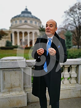 Rares Bogdan giving an interview in front of the Romanian Athenaeum