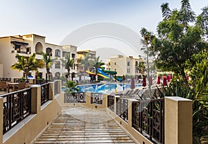 Ras Al Khaimah, UAE - 04.04.2022 - Shot of accommodation and the pool at The Cove Rotana resort. Holiday
