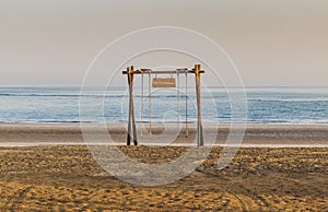 Ras Al Khaimah, UAE - 04.04.2022 - Swing by the beach at at The Cove Rotana Resort. Holiday