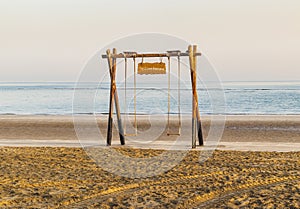 Ras Al Khaimah, UAE - 04.04.2022 - Swing by the beach at at The Cove Rotana Resort. Holiday