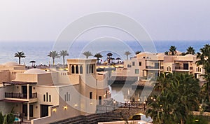 Ras Al Khaimah, UAE - 04.04.2022 - View of the beach and private villas at The Cove Rotana Resort. Holiday