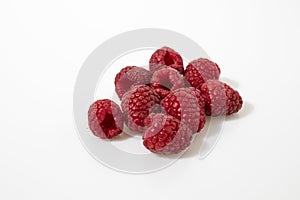 Rasberries in a white background composition