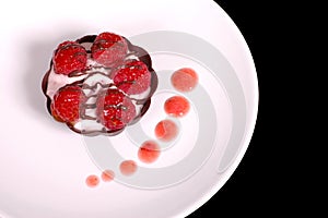 Rasberry mousse tart with strawberry sauce