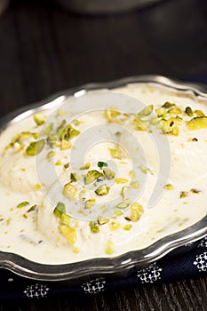 Rasmalai, an Indian Dessert with Paneer Cheese in Sweet Milk