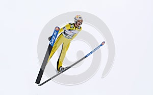 Rasnov, Romania - February 7: Unknown ski jumper competes in the FIS Ski Jumping World Cup Ladies