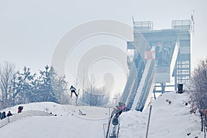 Rasnov, Romania - January 25: Unknown ski jumper competes in the FIS Ski Jumping World Cup Ladies