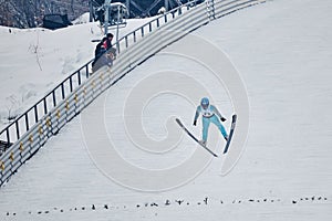 Rasnov, Romania - January 25: Unknown ski jumper competes in the FIS Ski Jumping World Cup Ladies