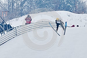 Rasnov, Romania - January 25: Unknown ski jumper competes in the FIS Ski Jumping World Cup Ladies