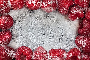 Raspberries on a black background