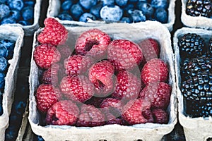 Raspberries, blackberries and blueberries market display