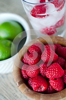 Raspberries and lime flavored drink photo