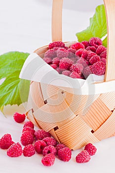 Raspberries in a small basket