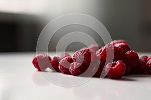 Raspberries on the table, close-up summer natural berries