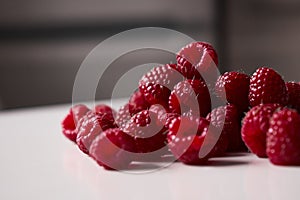 Raspberries on the table, close-up summer natural berries