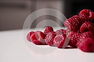 Raspberries on the table, close-up summer natural berries