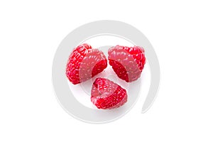 raspberries on white background from above