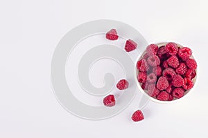 Raspberries on a white background