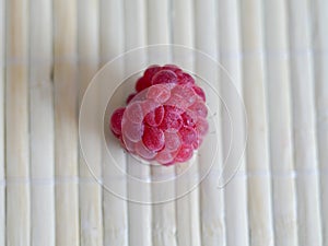 Raspberry on a bamboos background