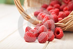 Raspberry in a basket on the table