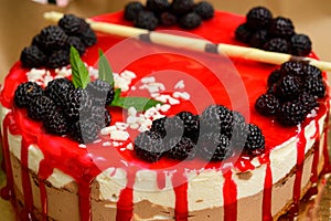 Raspberry cake and many fresh raspberries ,Forest wild berry fruits Muss cake with chocolate an white chocolate