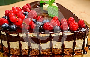 Raspberry cake and many fresh raspberries ,Forest wild berry fruits Muss cake with chocolate an white chocolate photo