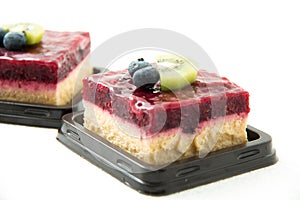 Raspberry cheese cake on white background