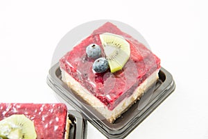 Raspberry cheese cake on white background