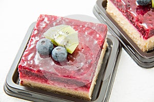 Raspberry cheese cake on white background
