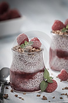 Raspberry chia pudding with granola