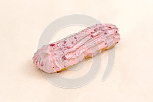 Raspberry Eclair cake, delicious pastries closeup on a light background