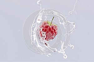 Raspberry falling in water splash mockup, depth of field