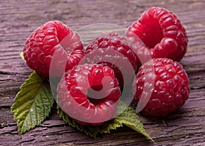 Raspberry fruit on wood