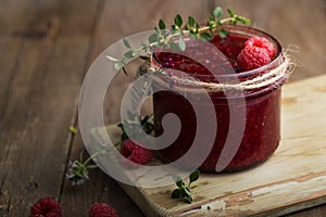 Raspberry jam with fresh raspberries and thyme. Raspberry fresh