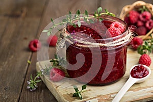Raspberry jam with fresh raspberries and thyme. Raspberry fresh