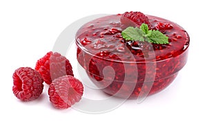 raspberry jam with raspberry berries isolated on white background