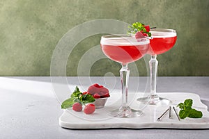 Raspberry martini cocktail with vodka, juice and raspberry liqueur