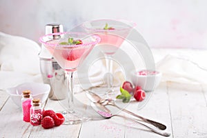 Raspberry martini on white table