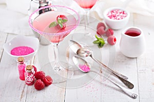 Raspberry martini on white table
